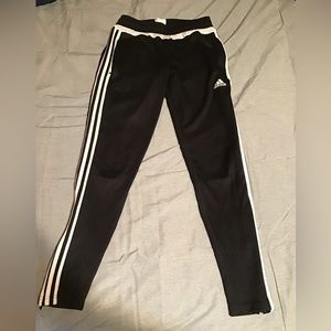 Women adidas track pants. Size small. Color black with white stripes.